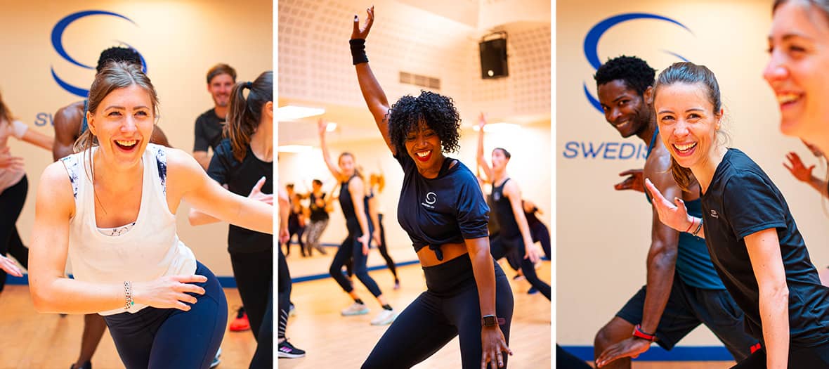 Ambiance dynamique lors d&rsquo;un cours collectif Swedish Fit &agrave; Paris avec participants souriants.